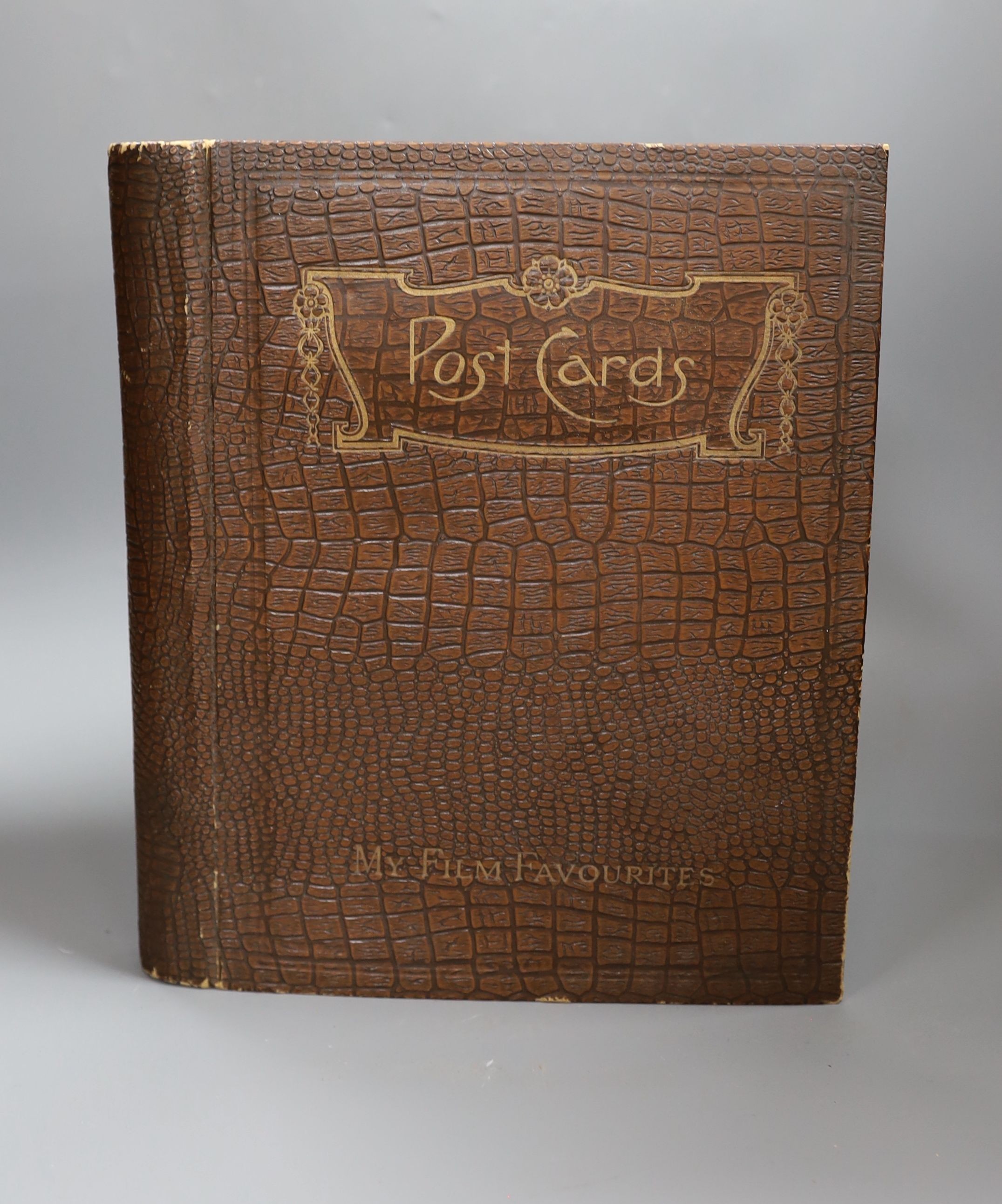 An album of approximately 160 early 20th century monochrome studio postcards including Garbo, Crosby, Gable and Hepburn.